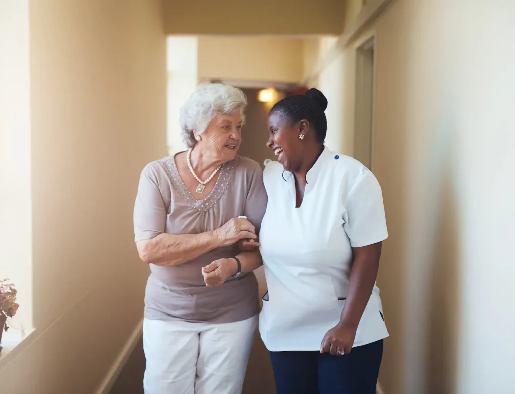 A older lady and her carer