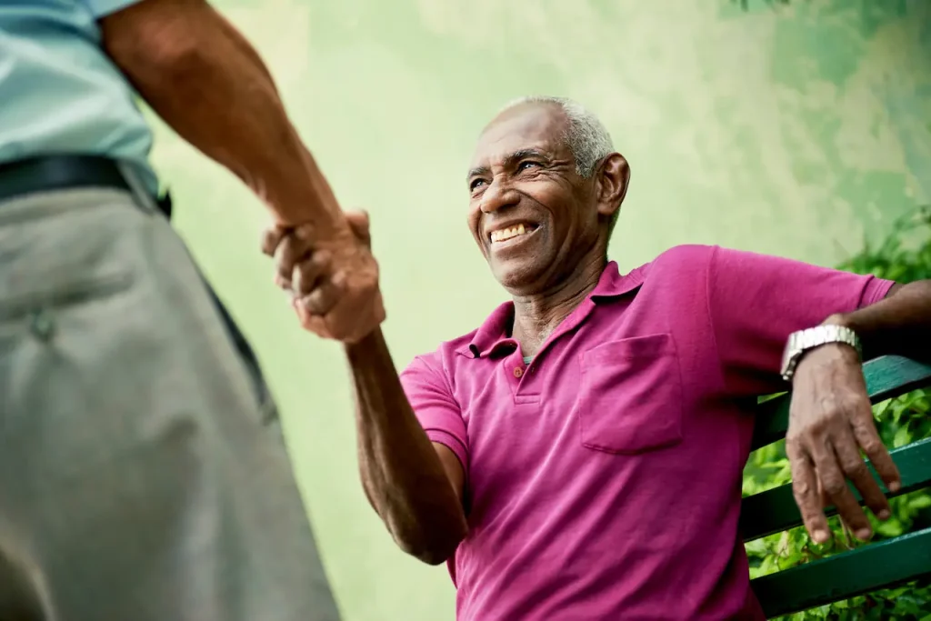 Two people holding hands